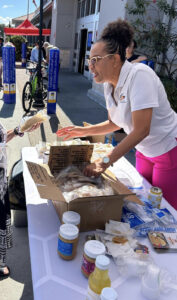 Woman sampling Oulala Peanut Butter at a Walmart in Miami