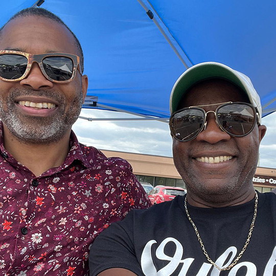 Stanley Dumornay and Leonce Jean Baptiste at a market
